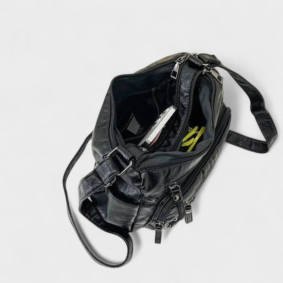 Nora. – Borsa a tracolla multilivello ispirata al vintage