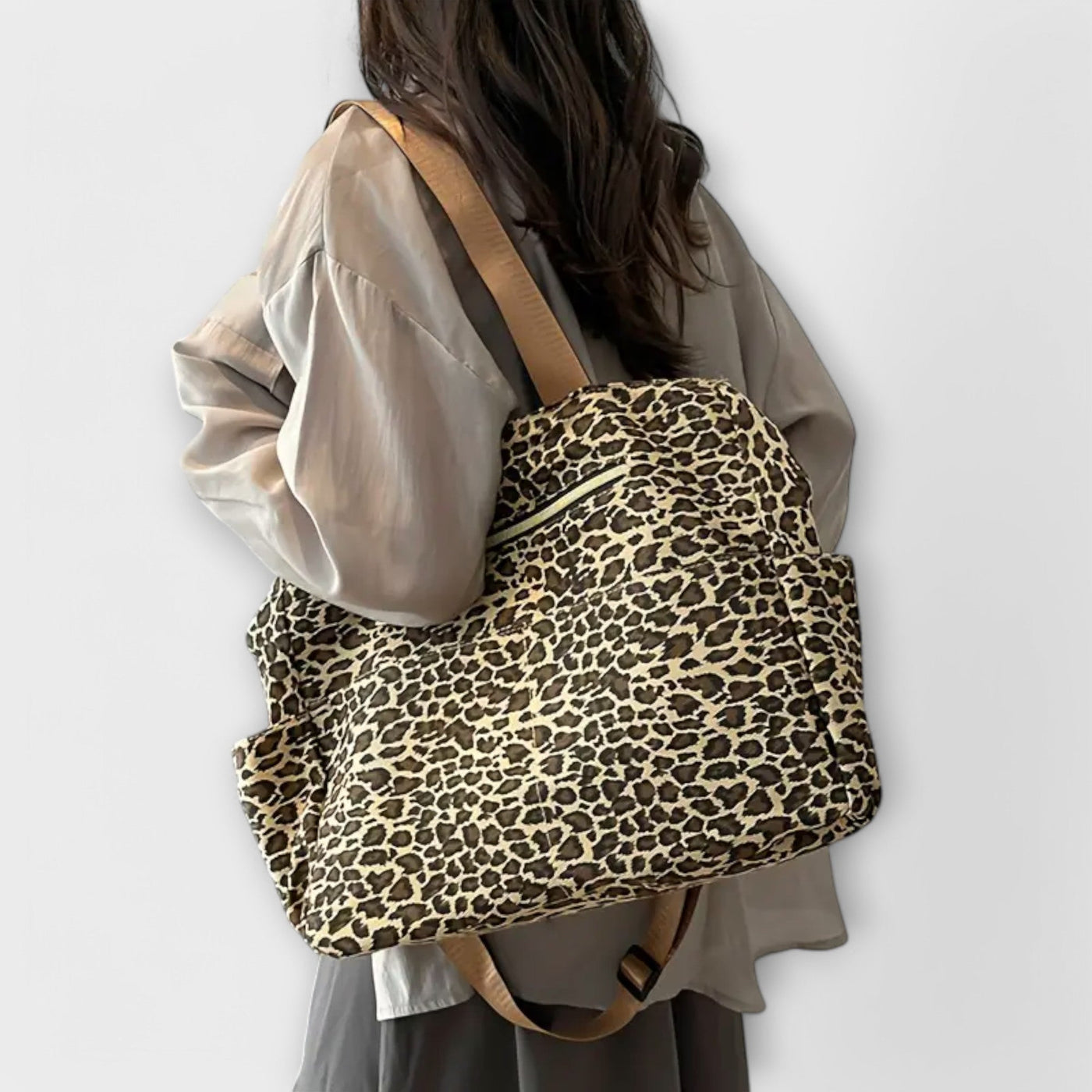 Nora. - Borsa a tracolla in tela con motivo leopardato