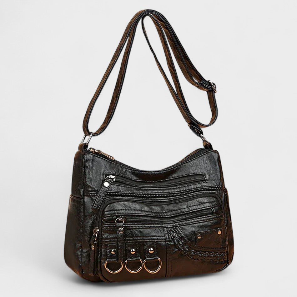 Nora. – Borsa a tracolla multilivello ispirata al vintage