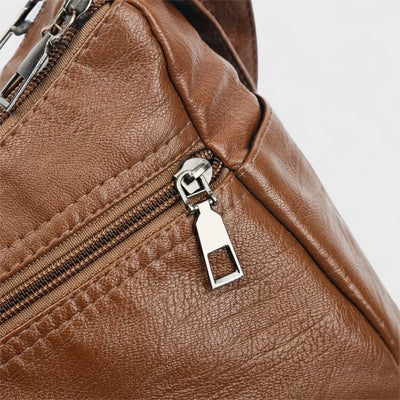 Nora. – Borsa a tracolla multilivello ispirata al vintage