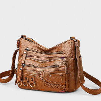Nora. – Borsa a tracolla multilivello ispirata al vintage