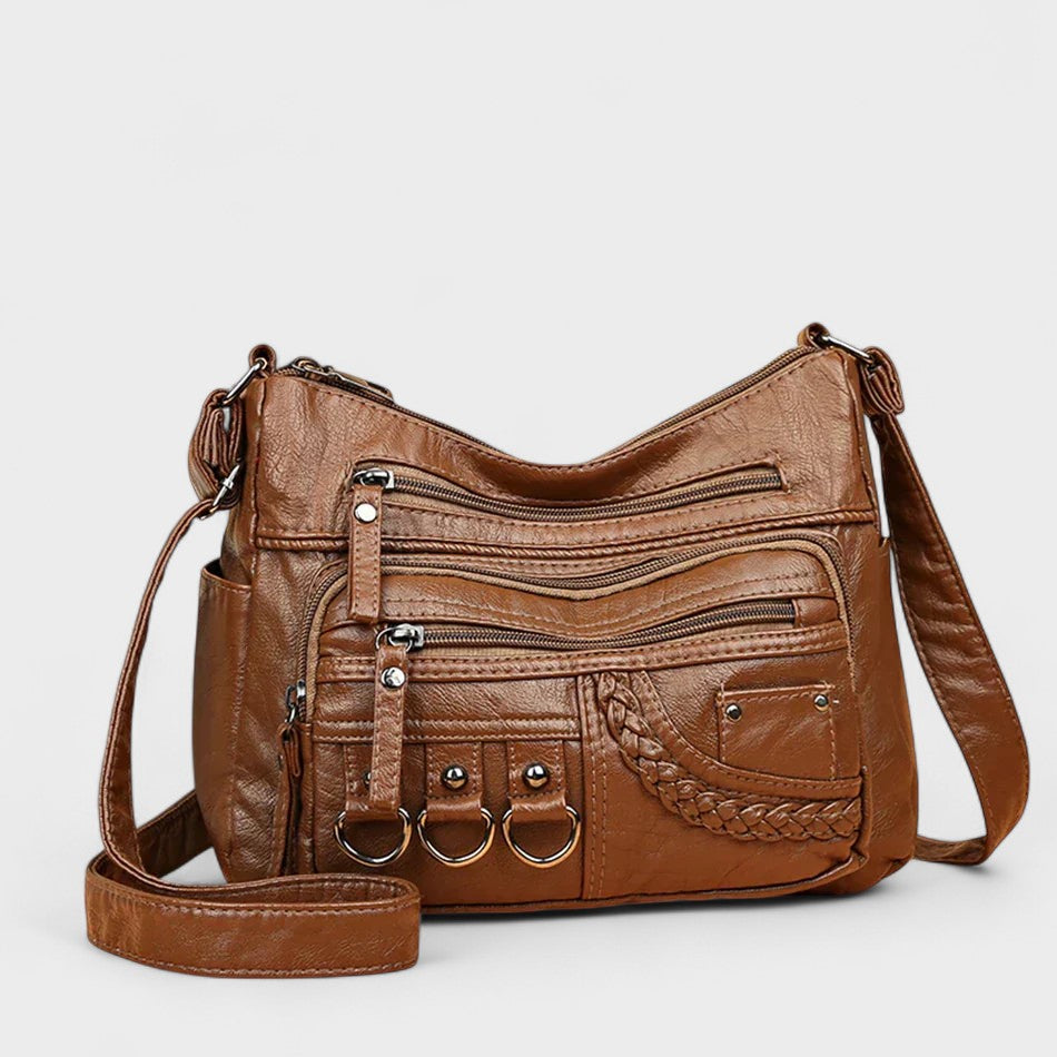 Nora. – Borsa a tracolla multilivello ispirata al vintage