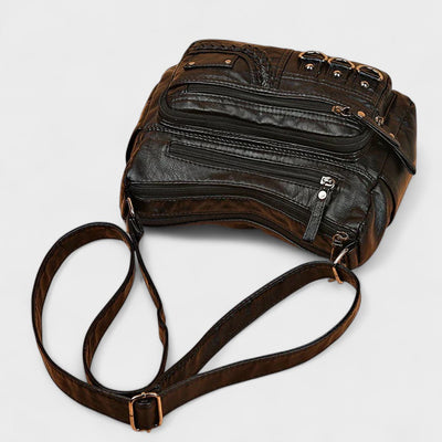Nora. – Borsa a tracolla multilivello ispirata al vintage