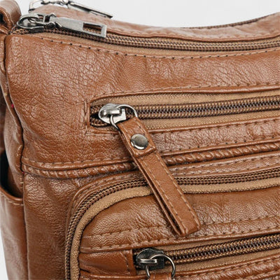 Nora. – Borsa a tracolla multilivello ispirata al vintage