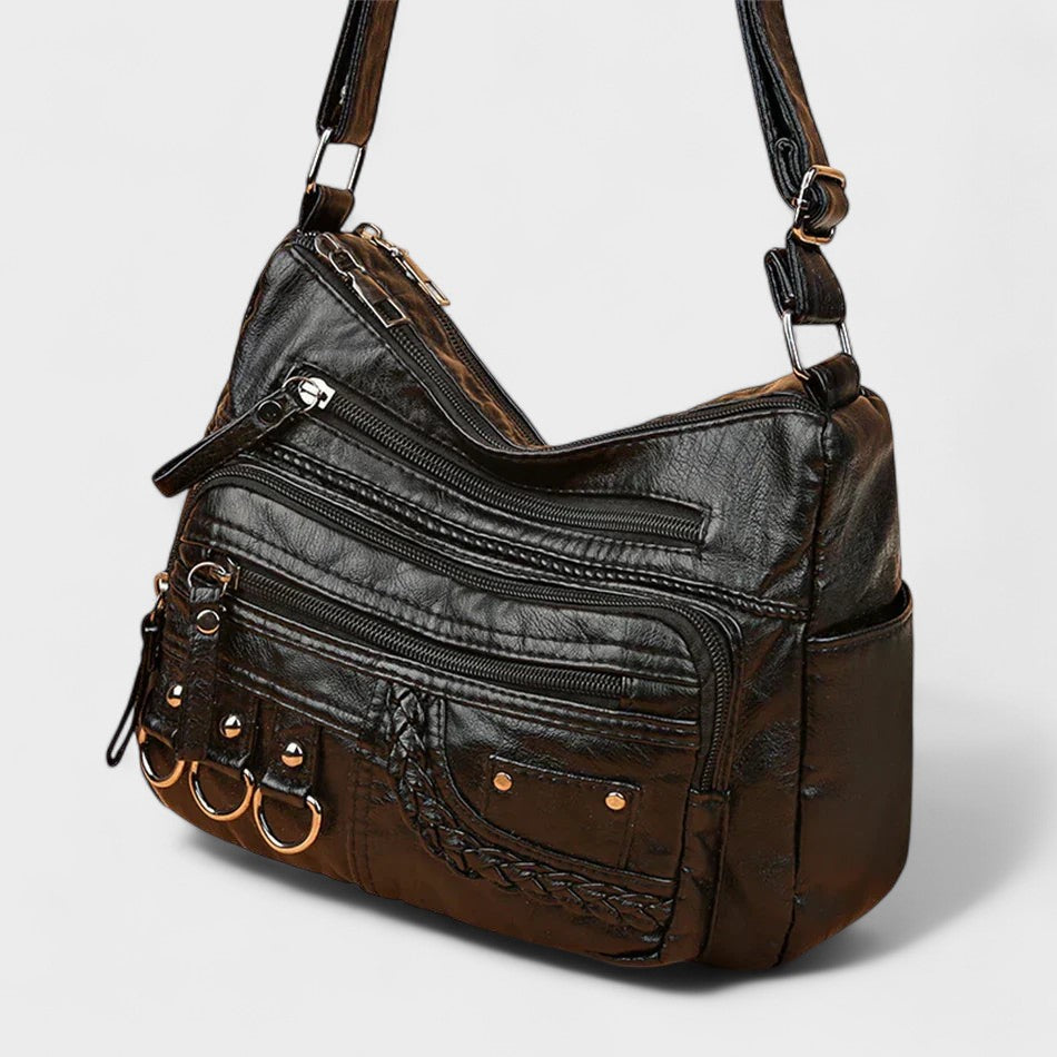 Nora. – Borsa a tracolla multilivello ispirata al vintage