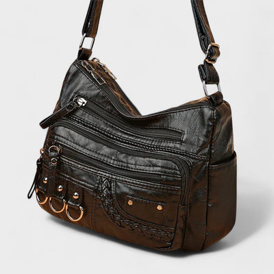 Nora. – Borsa a tracolla multilivello ispirata al vintage