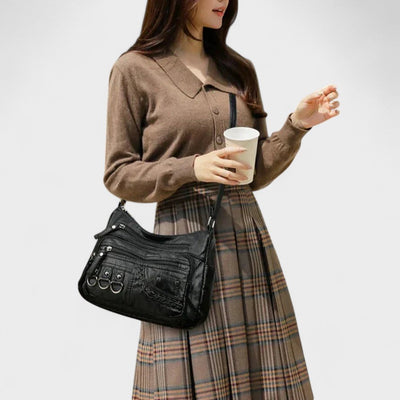 Nora. – Borsa a tracolla multilivello ispirata al vintage
