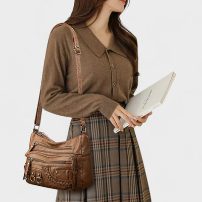 Nora. – Borsa a tracolla multilivello ispirata al vintage