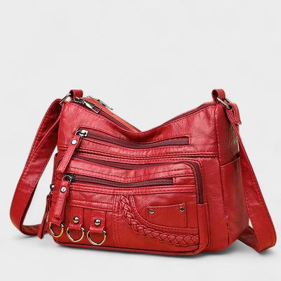 Nora. – Borsa a tracolla multilivello ispirata al vintage