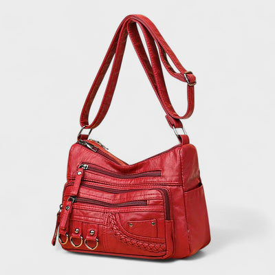 Nora. – Borsa a tracolla multilivello ispirata al vintage