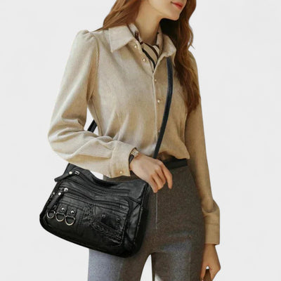 Nora. – Borsa a tracolla multilivello ispirata al vintage