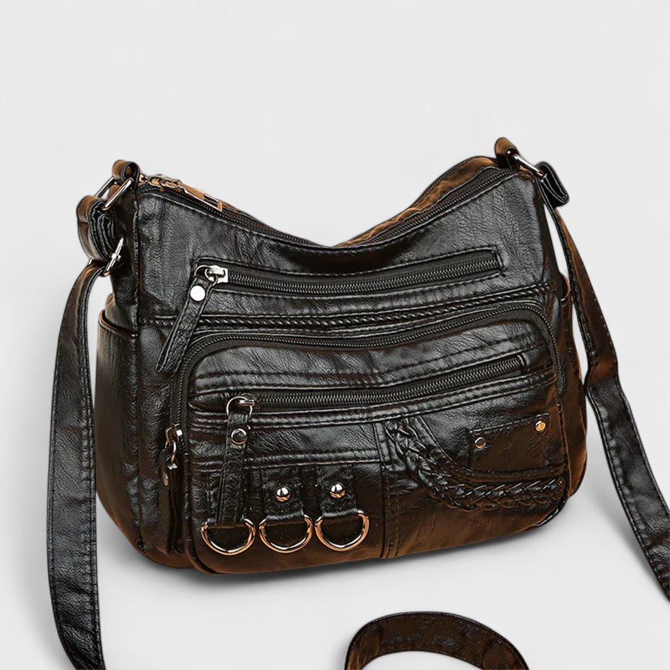 Nora. – Borsa a tracolla multilivello ispirata al vintage