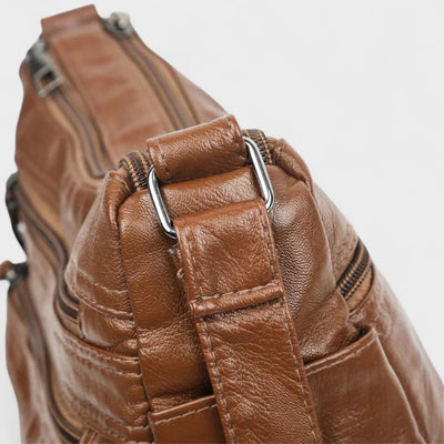 Nora. – Borsa a tracolla multilivello ispirata al vintage