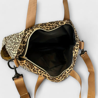 Nora. - Borsa a tracolla in tela con motivo leopardato