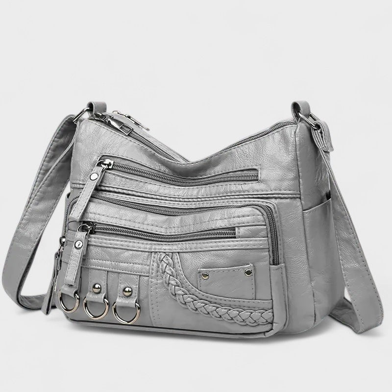 Nora. – Borsa a tracolla multilivello ispirata al vintage