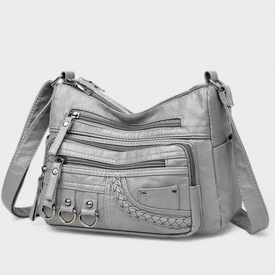 Nora. – Borsa a tracolla multilivello ispirata al vintage