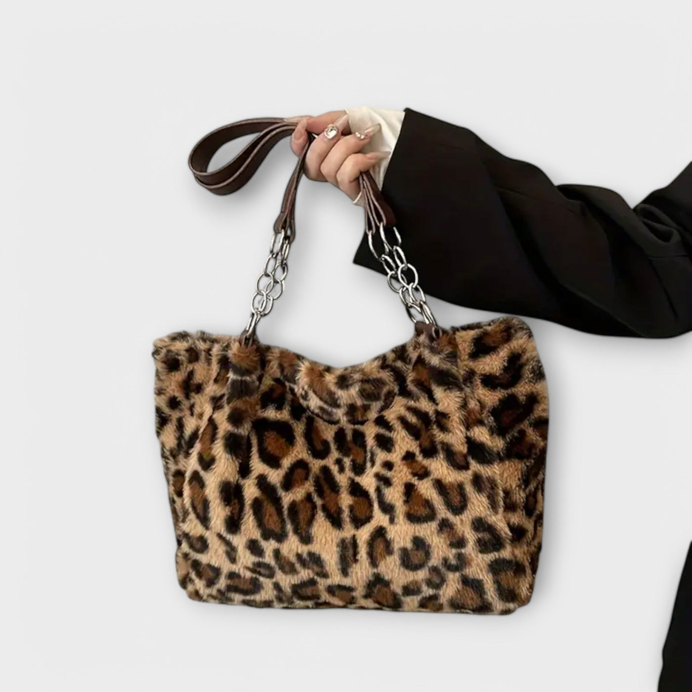 Nora. - Borsa in morbida pelliccia sintetica ispirata a un motivo leopardato alla moda
